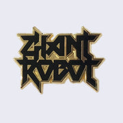 Black enamel pin with "Giant Robot" written in stylized heavy metal writing, with gold outline.