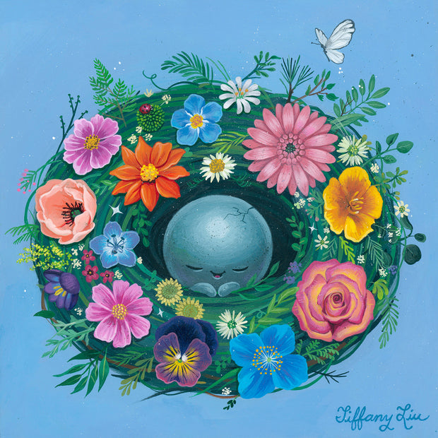 Painting of a round blue egg, with a small smiling cartoon face and a small crack in its shell, within a green nest that has many different kinds of colorful flowers. Background is a solid baby blue.