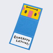 A tiny foldable paper card with a blue robot face laid flat. Example message on tiny card says congratulations.