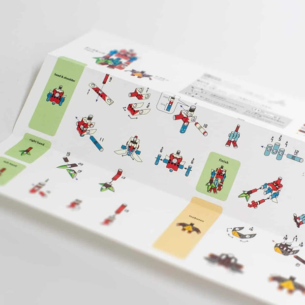 Paper instructions with step by step how to build Piperoid figures.