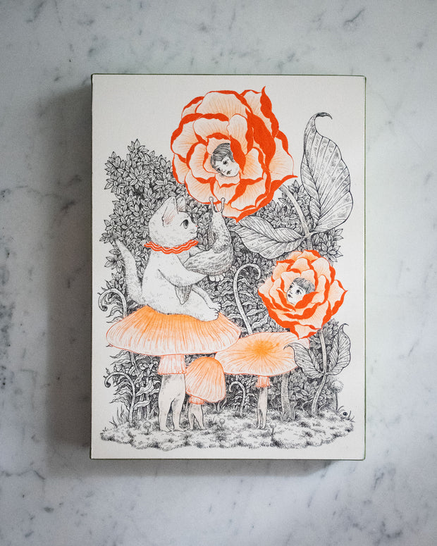 Ink drawing on white panel with orange color accents. A cat sits on a mushroom with legs, standing near 2 more mushrooms of the same kind. The cat holds a slug and looks at 2 large roses with woman's faces as the buds.