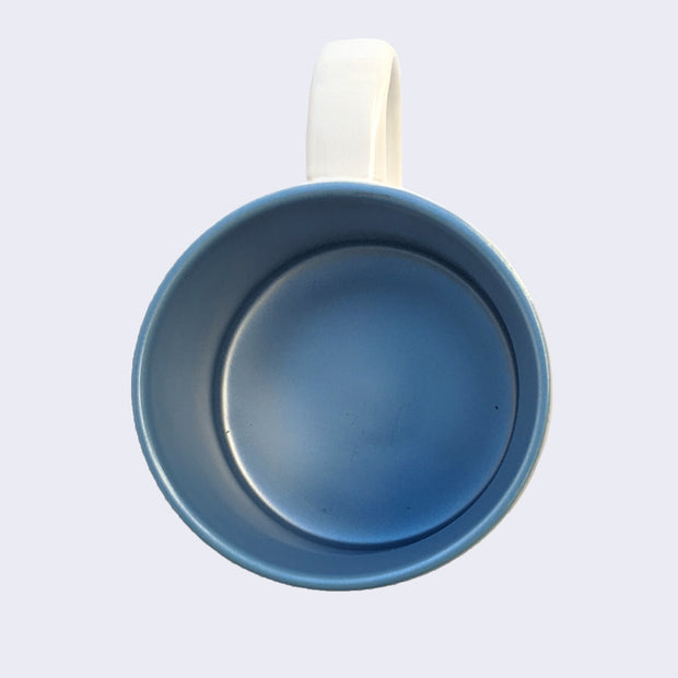Blue metallic interior of ceramic mug.