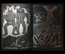 Open two page zine spread, silver ink illustrations of muscled armored aliens and a large alien bug on black paper.