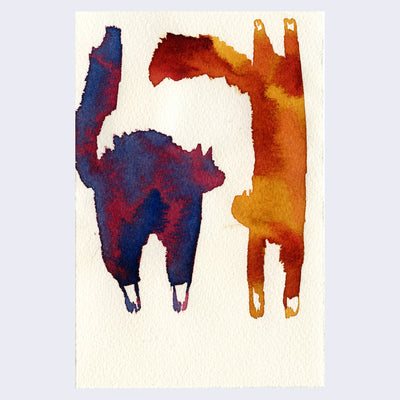 2 watercolor cats on cream paper, one is dark blue and red and the other is orange and yellow. The blue one is faced away, with its back arched as if scared. The orange is in a handstand position, with its face also turned away from the viewer.