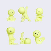 6 different Smiskis, a simple small character with a round head. Each does their own yoga pose.,