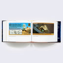 Open two page book spread of various Star Wars photographs and memorabilia.