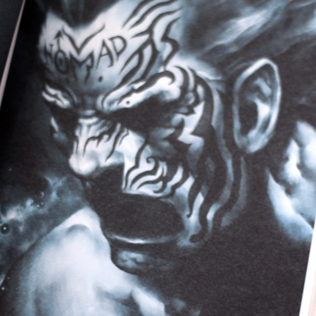 Black and white drawing of a muscular person with a full face tribal-like tattoo that says nomad.