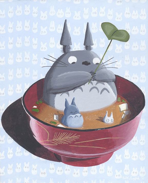 Painting of Totoro sitting in a bowl of miso soup. Light blue background with a pattern of small white totoro hopping around.