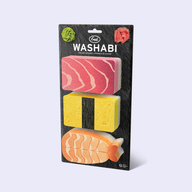 Set of 3 sponges, designed to look like sushi on a black backing card that reads "Washabi". Sponges are: tuna, tamago and shrimp.
