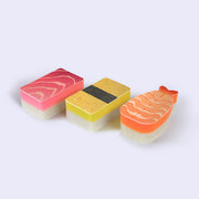 Set of 3 sponges, designed to look like sushi. Sponges are: tuna, tamago and shrimp.