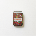 Gif of kimchi enamel pin, one image is of the pin in light and the other is of the pin glowing in the dark.