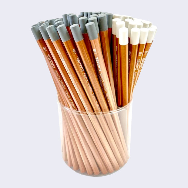 Clear cup holding a large collection of natural wood finished pencils with rubber lined tops, either white or gray. White text of the product specs run along the side of each pencil.