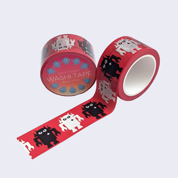 Two rolls of washi tape, one is wrapped and the other is rolled out to display pattern of red tape with alternating white and black Big Boss Robots.