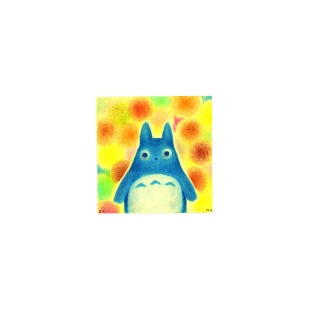 Colored pencil drawing of a blue chibi Totoro, looking at the viewer head on and only visible from the waist up. The background is made up of many blurred orange and yellow spheres, on a yellow post it note.
