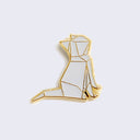 Enamel pin of an origami cat, with with gold accents.