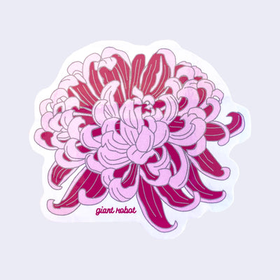 White cut out sticker with a blossoming pink and purple chrysanthemum. "Giant Robot" is written in small purple font on the bottom.