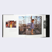 Open two page book spread. Two photographs of young children playing in an urban setting. Informational text accompanies photos.