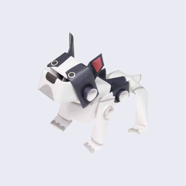 Small black and white french bulldog sculpture made out of paper pipes.