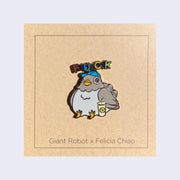 Enamel pin of a chubby, gray pigeon wearing a baseball cap and sitting next to a soda. "Fuck" is written above its head.