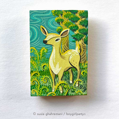 Painting on wood panel of a deer standing in tall grass with fiddlehead ferns. A large tree stands in the background against a teal sky.