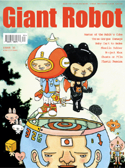 Giant Robot Issue #30 magazine cover, featuring illustration of a robot head with a clear dome on its head. A character dressed in an all black outfit and a character dressed in a polo and space helmet stand on its head.  