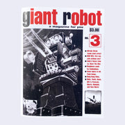 Giant Robot issue 3. It features a black and white robot illustration from a tin toy box. It's facing left and firing missiles. There is cover text that says Alfredo Alcala, MAK 90, Emilys Sassy Lime, Doughnuts made by Cambodians, Asian Topics in Punk Songs, Hong Kong films, UFC V, Pizzicato, Sebadoh.