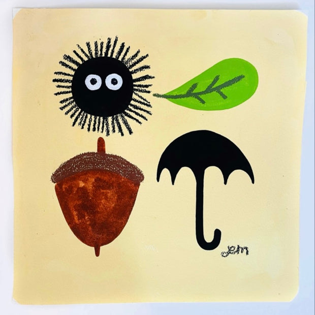 Simple four element painting on pastel yellow background of a black soot sprite, a green leaf, a brown acorn and a black umbrella. Arranged in a 2 x 2 grid like format