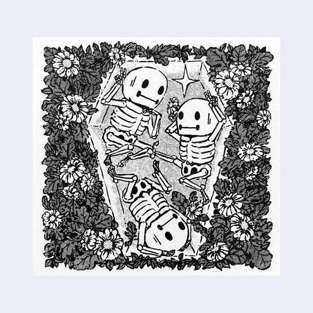 Greyscale square sticker of three cartoon skeletons inside of a coffin, surrounded by lush cartoon flowers.