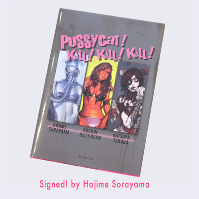 "Pussycat! Kill! Kill! Kill!" book cover, title written in bold pink font. Cover is gray and divided into 3 parts, displaying a different woman drawn by each of the 3 artists.