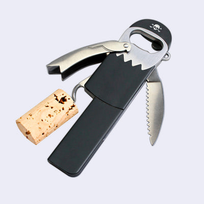 A multitool bottle opener that resembles a pirate, with one of his legs being a corkscrew, his faced being a bottle opener and his arm being a foil cutter.