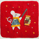 Felt 2D sculpture on red background of a gray mouse wearing a patterned robe and holding a paper lantern.