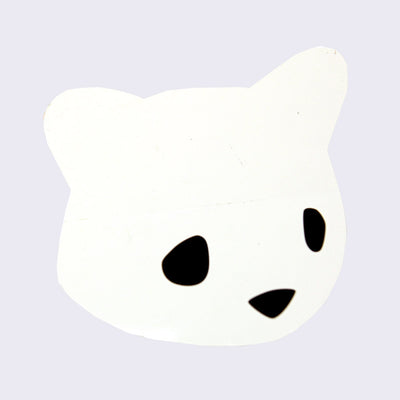 White die cut sticker of a simplified cartoon bear head, with only black eyes and a nose.