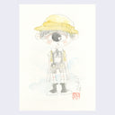 Pencil and watercolor illustration of a cartoon cyclops character standing, wearing a yellow hat with a bow and black overall shorts, with yellow backpack straps showing. There is faint blue watercoloring behind the character and Japanese writing to the right.