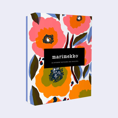 Product packaging of Marimekko notecards, with a graphic and strong shaped floral design on the cover. Text reads "marimekko 16 different notecards and envelopes"