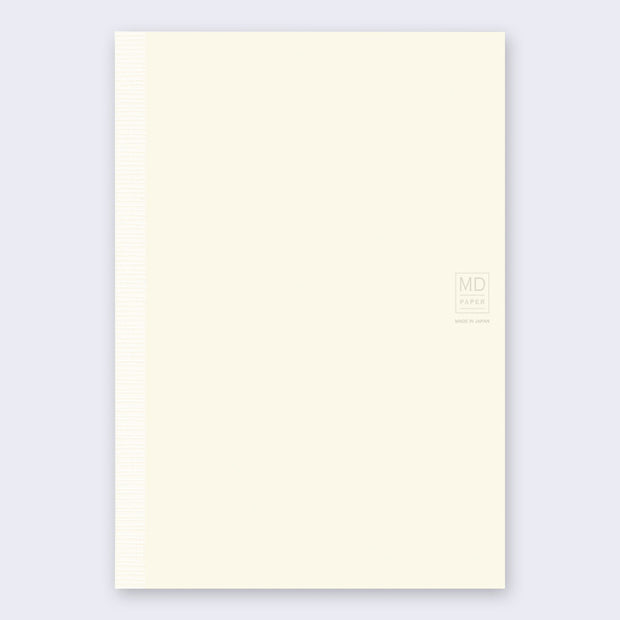 Cream colored bound notebook with a small design on the right that reads "MD Paper Made in Japan"