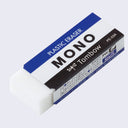 White plastic eraser, rectangular in a paper sleeve that reads "MONO"