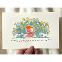 Illustration of a small pink haired girl with a red knit beanie hat, sitting on the ground with a dog wrapped around her lap. Behind her is a field of large yellow flowers and various greenery.