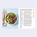 Open book 2 page excerpt featuring a recipe for Niu Rou Mian, accompanied by a photo of the finished dish.