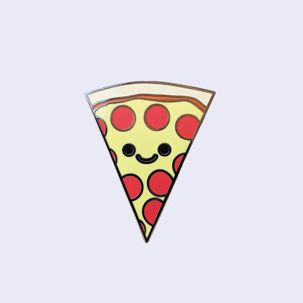 Enamel pin of a smiling illustrated pepperoni pizza slice.