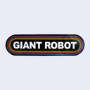 Long rounded corner rectangle sticker, black with the words "Giant Robot" written in bold, all caps white font in the center. It is surrounded by 6 thin lined borders, each a different color of the rainbow.