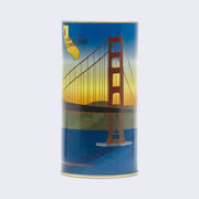 Cylinder can with a graphic of the Golden Gate Bridge with a blue to yellow ombre sunset in the background.