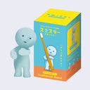 Smiski positioned with slightly open curves arms, as if hugging air. With the empty space meant for a toothbrush.