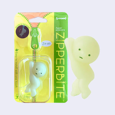 Smiski with their arms extended and knees slightly lifted, in a "hanging on" position.