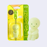 Smiski sitting on the ground and hugging their knees.