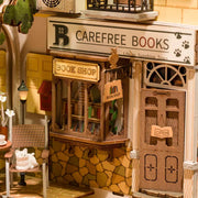 Detail shot of fully assembled Sushine Town Bookend, displaying a shopfront for "Carefree Books" with a window display full of books,.