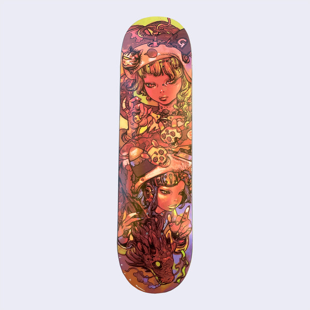 Skateboard deck with lime green and purple background, mostly covered by an intricate illustration of two woman with detailed helmets and skull details, with a red dragon on the bottom.