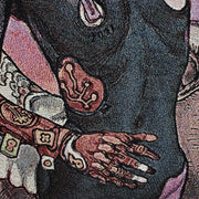 Close up of tapestry, displaying a mechanical hand attached to a woman.