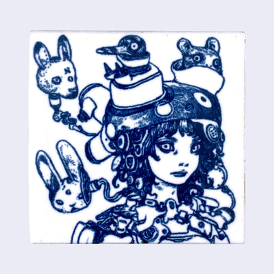 White ceramic square tile with a deep blue line art illustration of a girl with a surprised look on her face, wearing a helmet and with many mechanical elements and wires coming out of her body. Floating around her are animal heads, a bunny, a penguin, a bear and a deer.