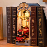 View of 3D "Time Travel" model kit in between several books, with lights illuminating the inside of the scene.