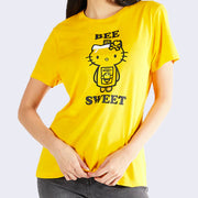 Yellow t-shirt, with Hello Kitty designed as a honey bottle. "Bee Sweet" is written in bold black font above and below her.